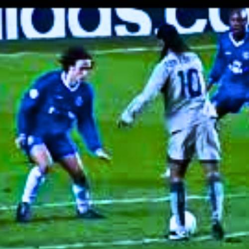 Ronaldinho scoring his iconic goal against Chelsea in the UEFA Champions League