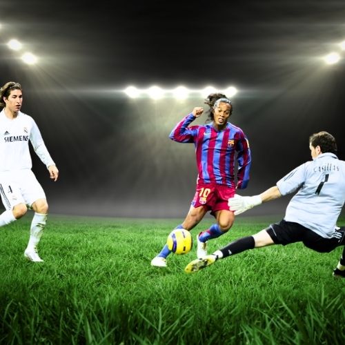 Ronaldinho scoring a goal past Iker Casillas at the Bernabeu with Sergio Ramos nearby