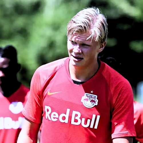 Erling Haaland wearing FC Red Bull Salzburg red jersey with Red Bull logo on chest