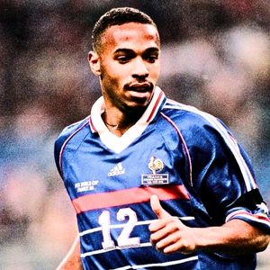 Thierry Henry wearing the France national team blue jersey with number 12