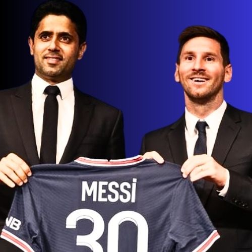 Lionel Messi standing next to Paris Saint-Germain president Nasser Al-Khelaifi during his official signing ceremony, both smiling and proudly holding up a brand-new PSG jersey with Messi’s name and number on the back. The background features the PSG logo and club banners, while photographers and flashing cameras capture the historic moment. Messi, dressed in a sharp suit, looks happy and emotional as he begins a new chapter in his career after leaving Barcelona.